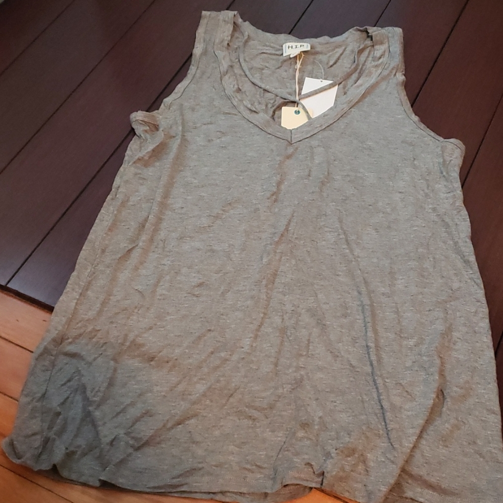 H.I.P. happening in the present grey tank